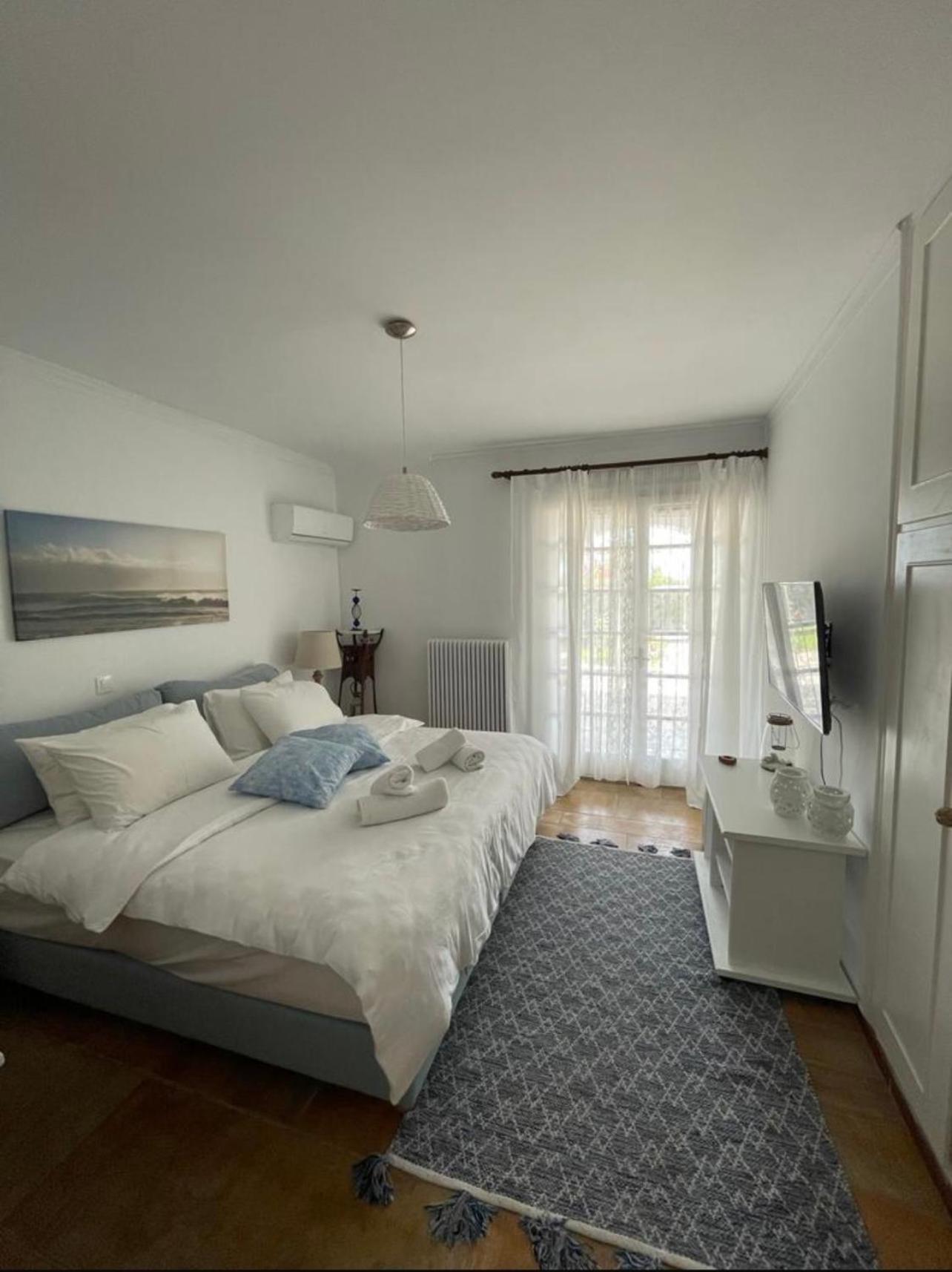 Sarwnisland Villa Lagonisi Buitenkant foto